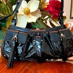 Burberry patent leather quilted purse.